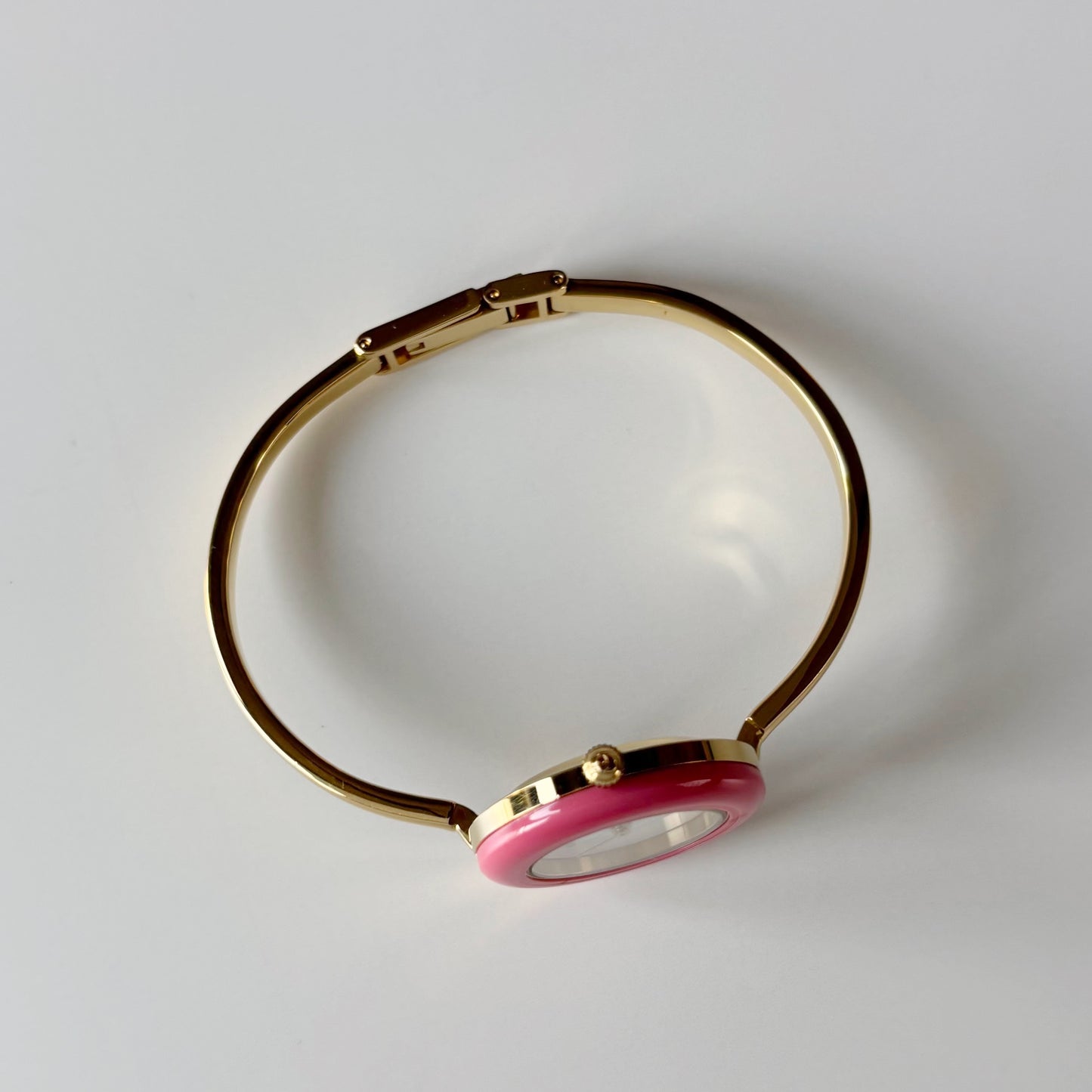Gucci 1990s Interchangeable Bezel Gold Plated Bangle Watch with case, 12 bezels