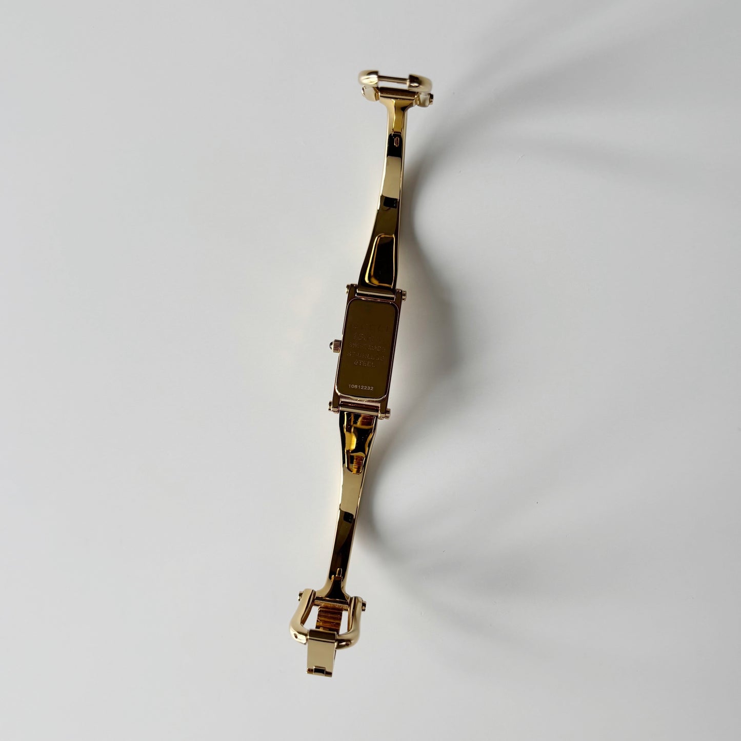 Gucci 1990s Gold Rectangular Dial Gold Plated Bangle Watch
