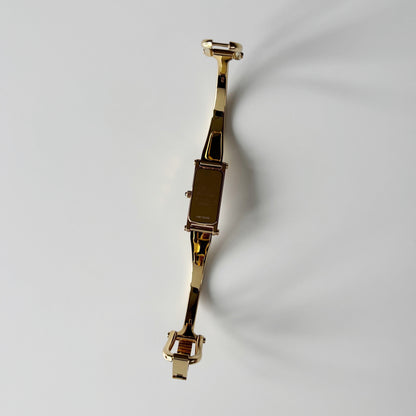 Gucci 1990s Gold Rectangular Dial Gold Plated Bangle Watch