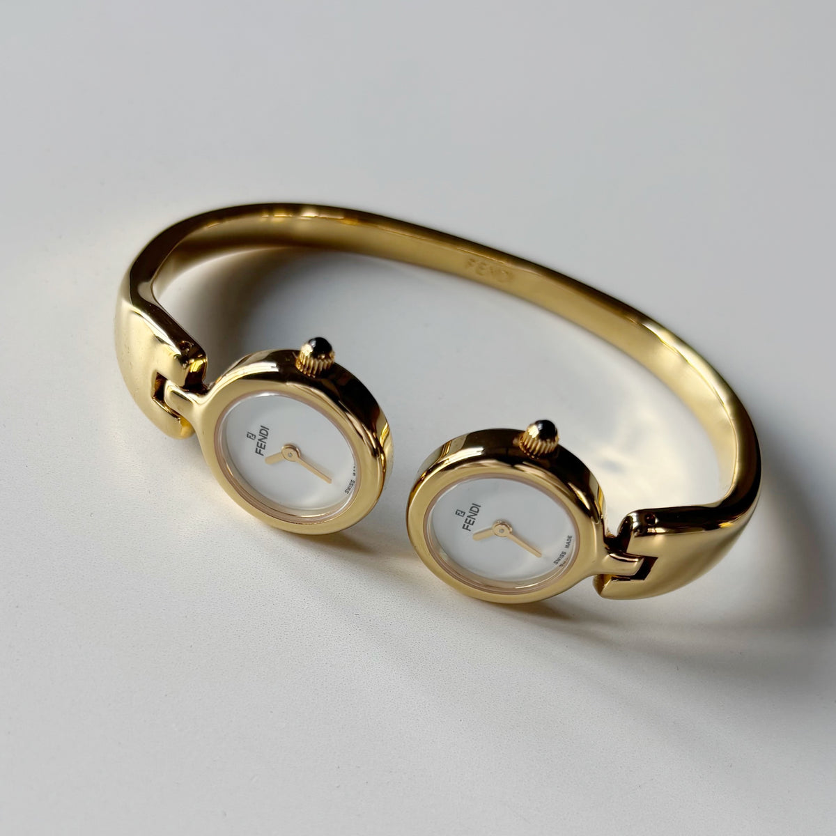 Fendi 1990s Seashell Dial Two Time Zone Gold Plated Bangle Watch