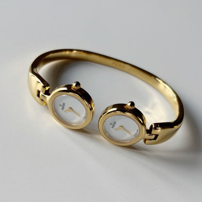 Fendi 1990s Seashell Dial Two Time Zone Gold Plated Bangle Watch