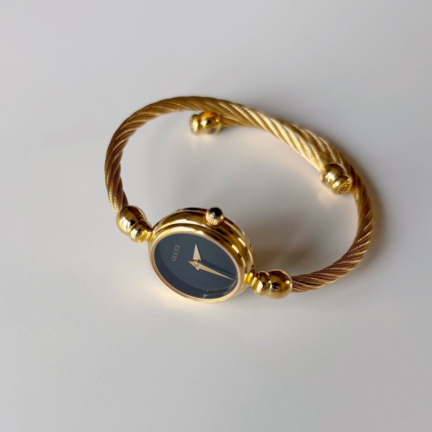 Gucci 1990s Black Dial Gold Plated Cable Bangle Watch