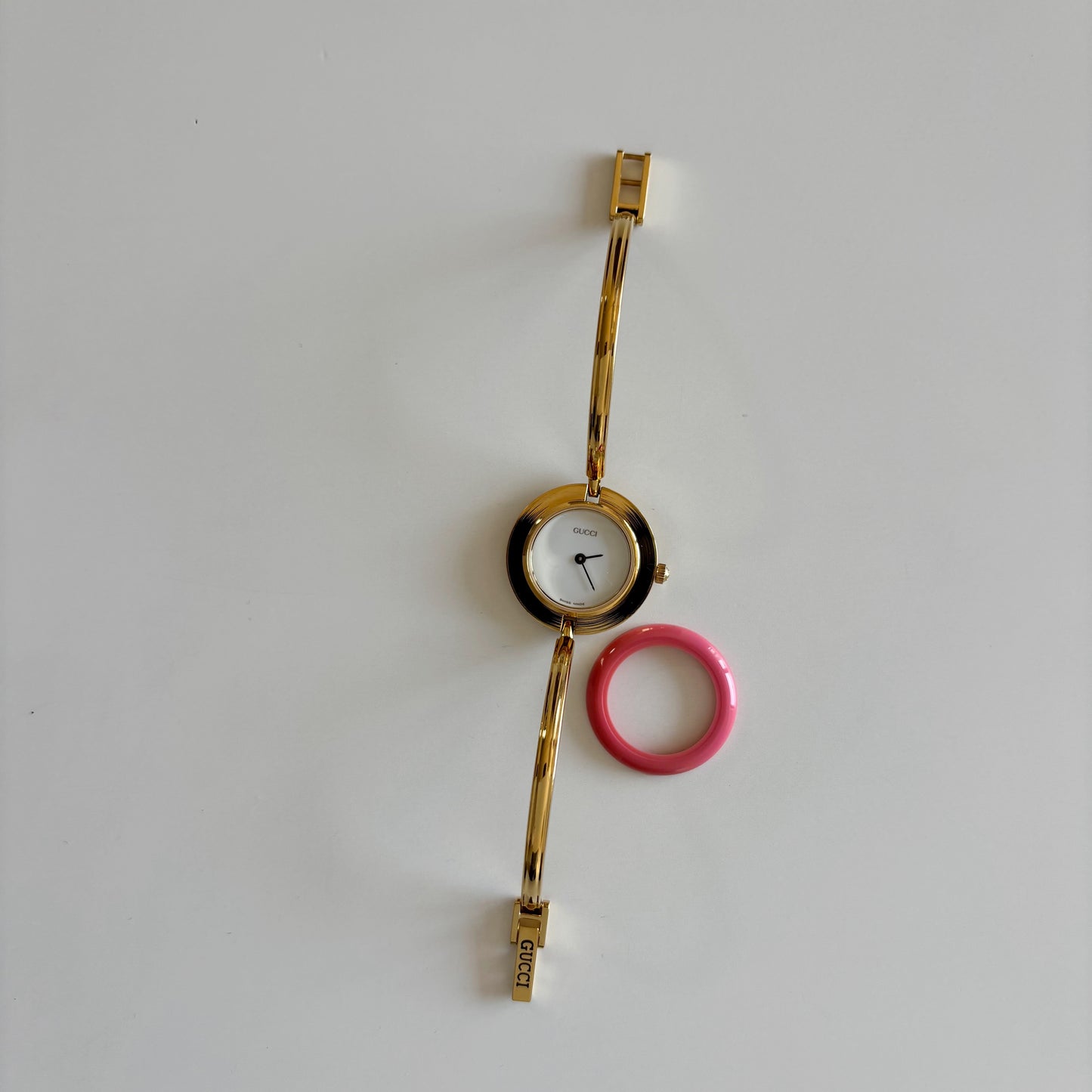 Gucci 1990s Interchangeable Bezel Gold Plated Bangle Watch with 12 bezels, case