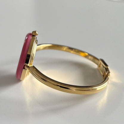 Gucci 1990s Interchangeable Bezel Gold Plated Bangle Watch with 12 bezels, case (Small)
