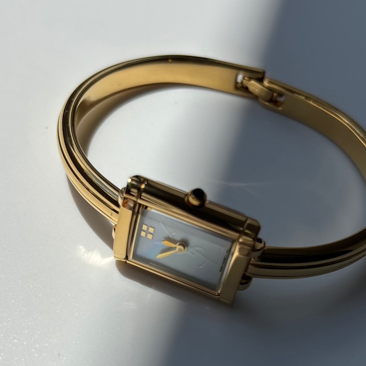 Yves Saint Laurent 1990s Seashell Dial Gold Plated Bangle Watch