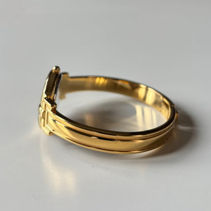 Givenchy 1990s Round Dial Gold Plated Bangle Watch