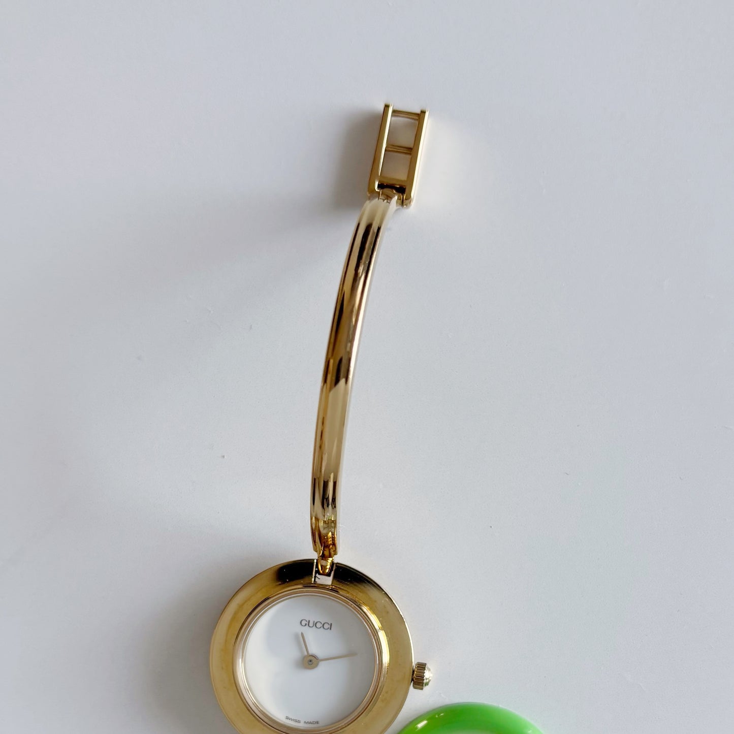Gucci 1990s Interchangeable Bezel Gold Plated Bangle Watch with 12 bezels, case