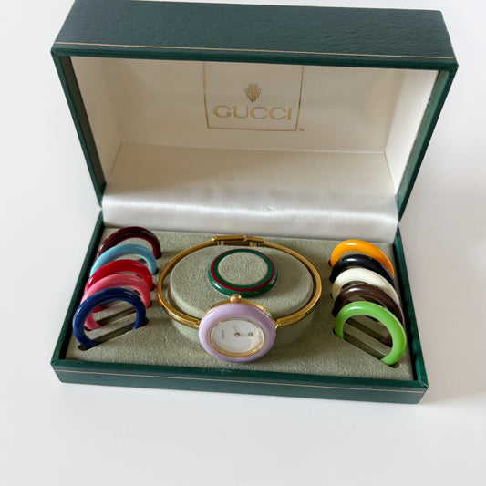Gucci 1990s Interchangeable Bezel Gold Plated Bangle Watch with 12 bezels, case