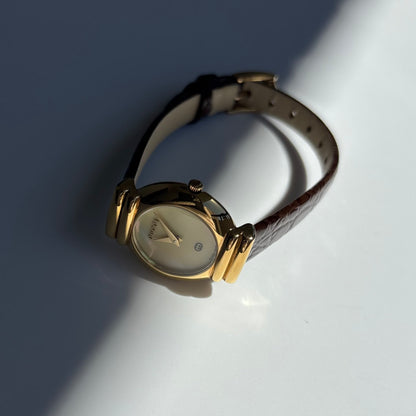 Gucci 1990s Seashell Round Dial Gold Plated Watch