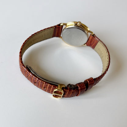 Dior 1990s Seashell Round Dial Gold-Plated Watch
