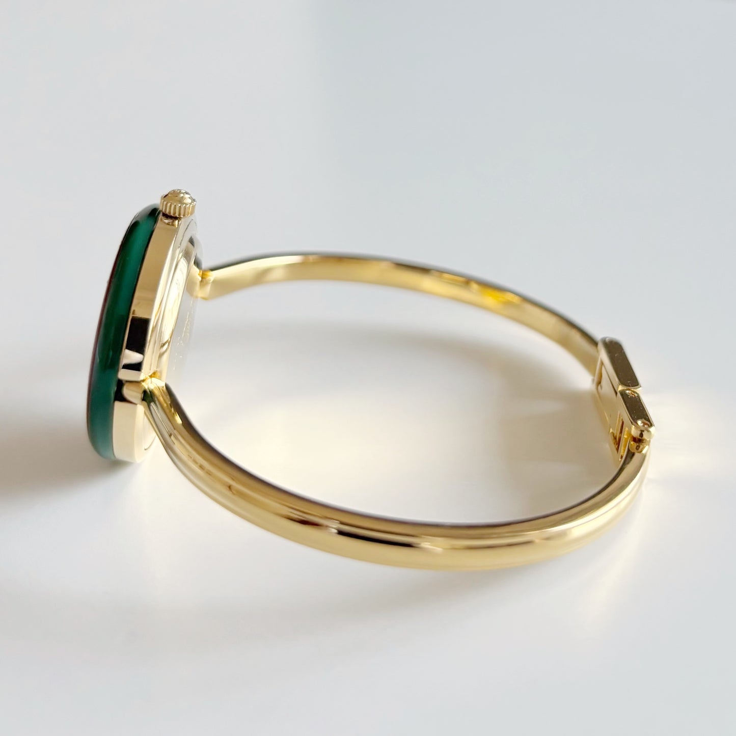 Gucci 1990s Interchangeable Bezel Gold Plated Bangle Watch with 12 bezels, case