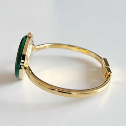 Gucci 1990s Interchangeable Bezel Gold Plated Bangle Watch with 12 bezels, case