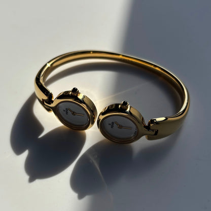 Fendi 1990s Seashell Dial Two Time Zone Gold Plated Bangle Watch