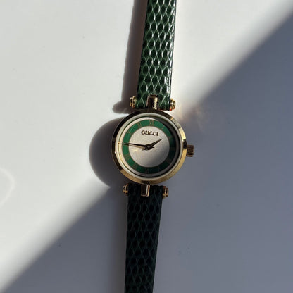 Gucci 1990s Round Dial Green Gold Plated Watch