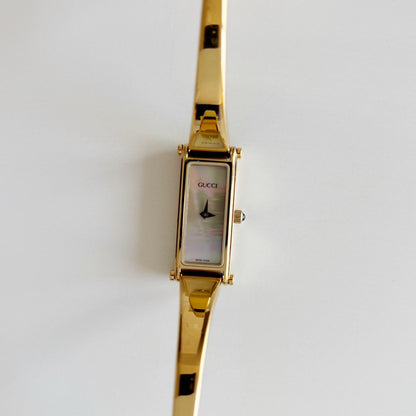 Gucci 1990s Seashell Dial Rectangular Gold Plated Bangle Watch