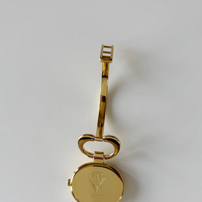 Gucci 1990s Seashell Oval Dial Gold Plated Bangle Watch (Small)
