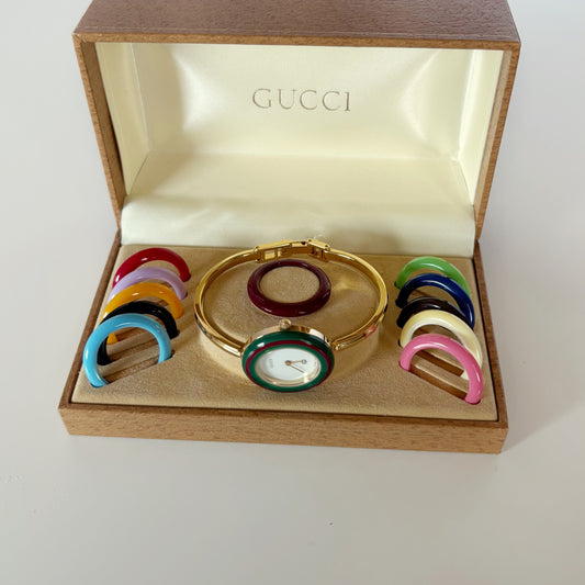 Gucci 1990s Interchangeable Bezel Gold-Plated Bangle Watch with 12 Bezels and Case (Small)