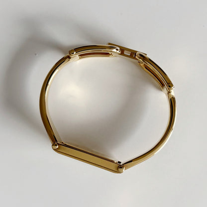 Gucci 1990s Seashell Rectangular Dial Gold Plated Bangle Watch (Small)