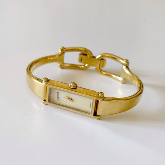 Gucci 1990s Seashell Dial Gold Plated Rectangular Bangle Watch