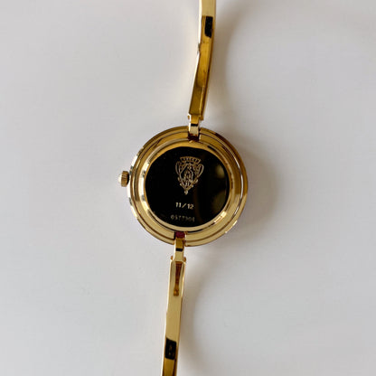 Gucci 1990s Interchangeable Bezel Gold Plated Bangle Watch with 12 bezels, case