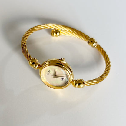 Gucci 1990s Seashell Dial Gold Plated Cable Band Bangle Watch