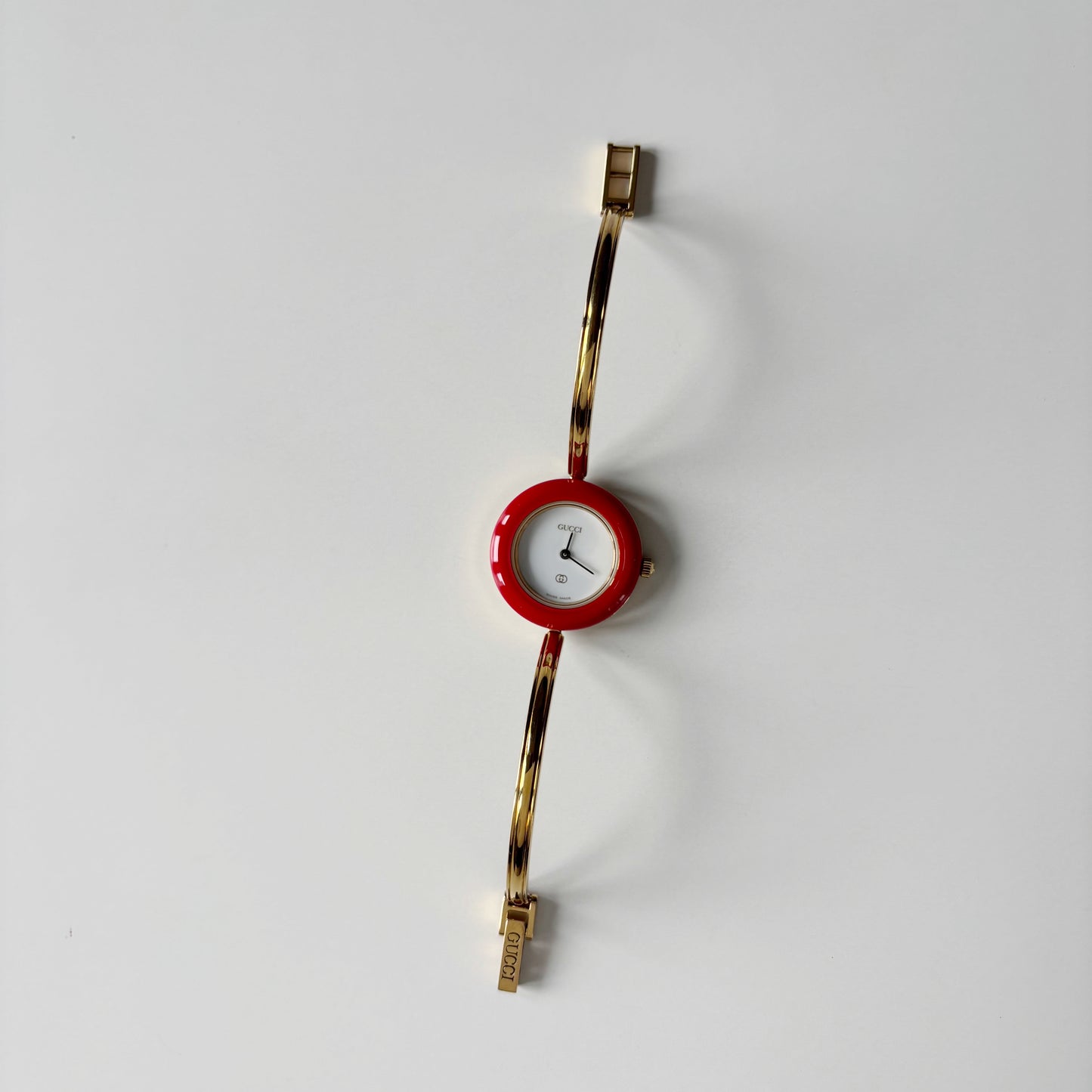 Gucci 1990s Interchangeable Bezel Gold Plated Bangle Watch with 12 bezels, case