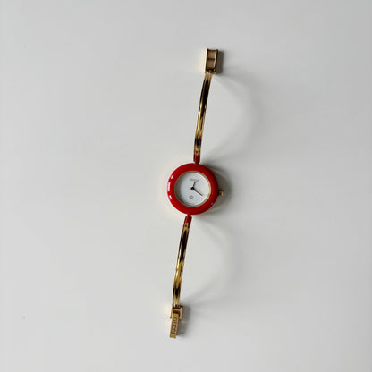 Gucci 1990s Interchangeable Bezel Gold Plated Bangle Watch with 12 bezels, case