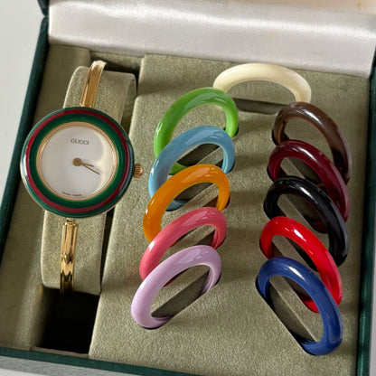 Gucci 1990s Interchangeable Bezel Gold Plated Bangle Watch with 12 bezels, case