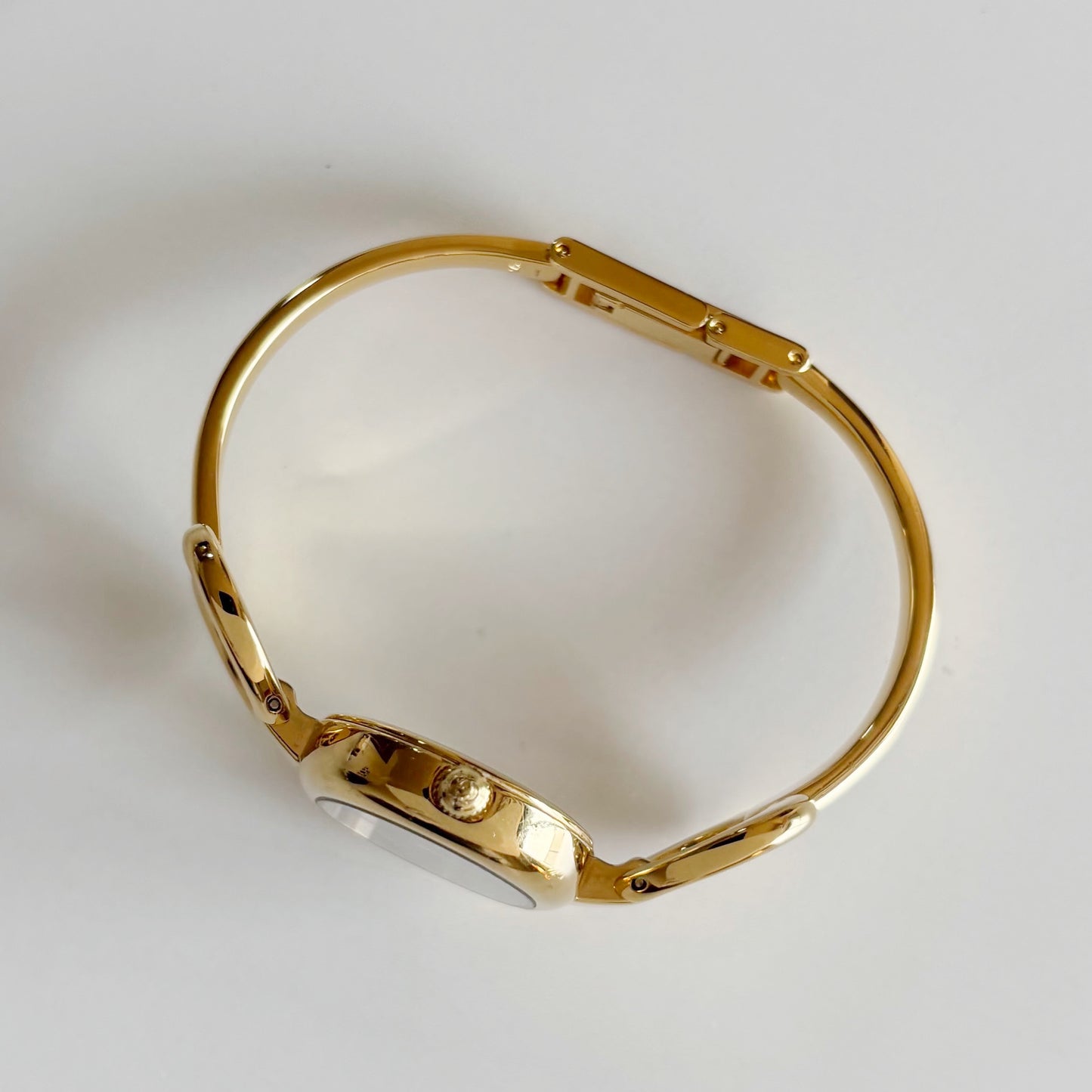 Gucci 1990s Oval Black Dial Gold Plated Bangle Watch (Small)