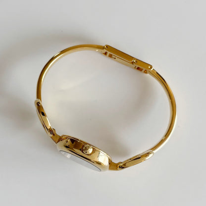 Gucci 1990s Oval Black Dial Gold Plated Bangle Watch (Small)