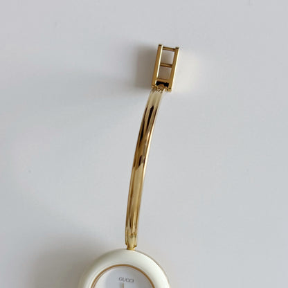 Gucci 1990s Interchangeable Bezel Gold Plated Bangle Watch with 12 bezels, case