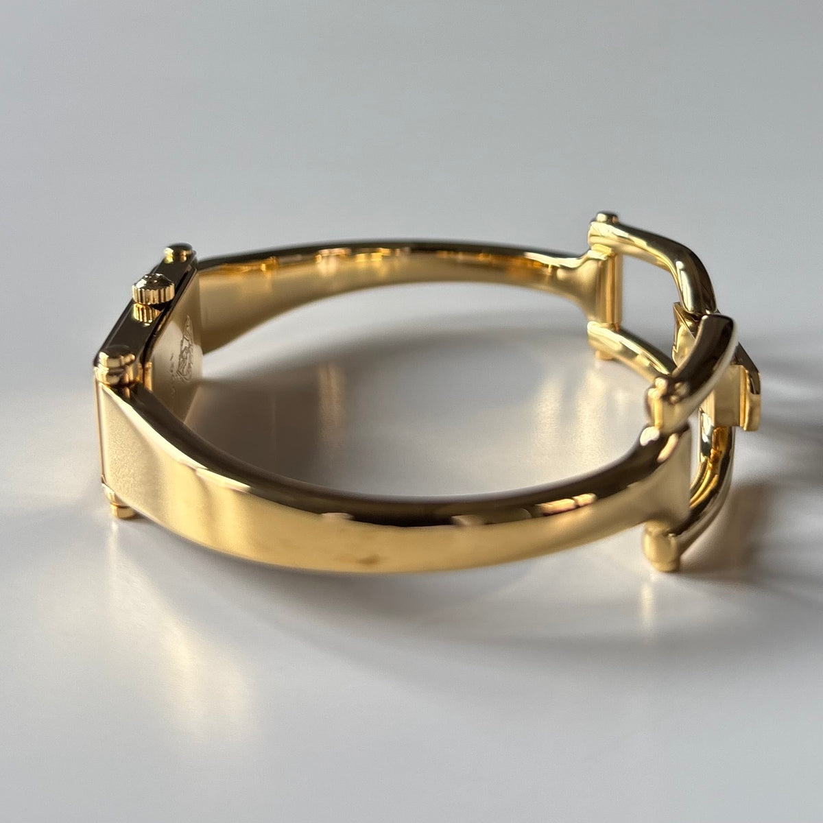 Gucci 1990s Gold Rectangular Dial Gold Plated Bangle Watch