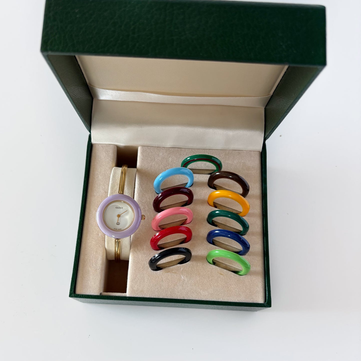 Gucci 1990s Interchangeable Bezel Gold Plated Bangle Watch with 12 bezels, case