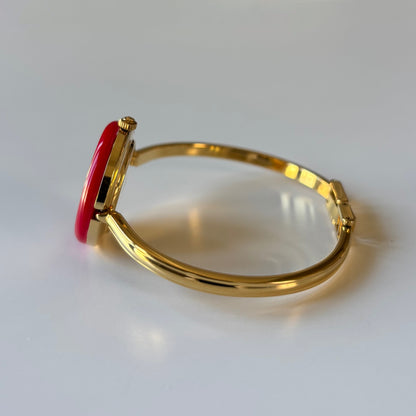 Gucci 1990s Interchangeable Bezel Gold Plated Bangle Watch with 12 bezels, case