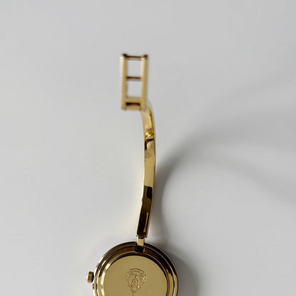 Gucci 1990s Interchangeable Bezel Gold Plated Bangle Watch with 12 bezels, case