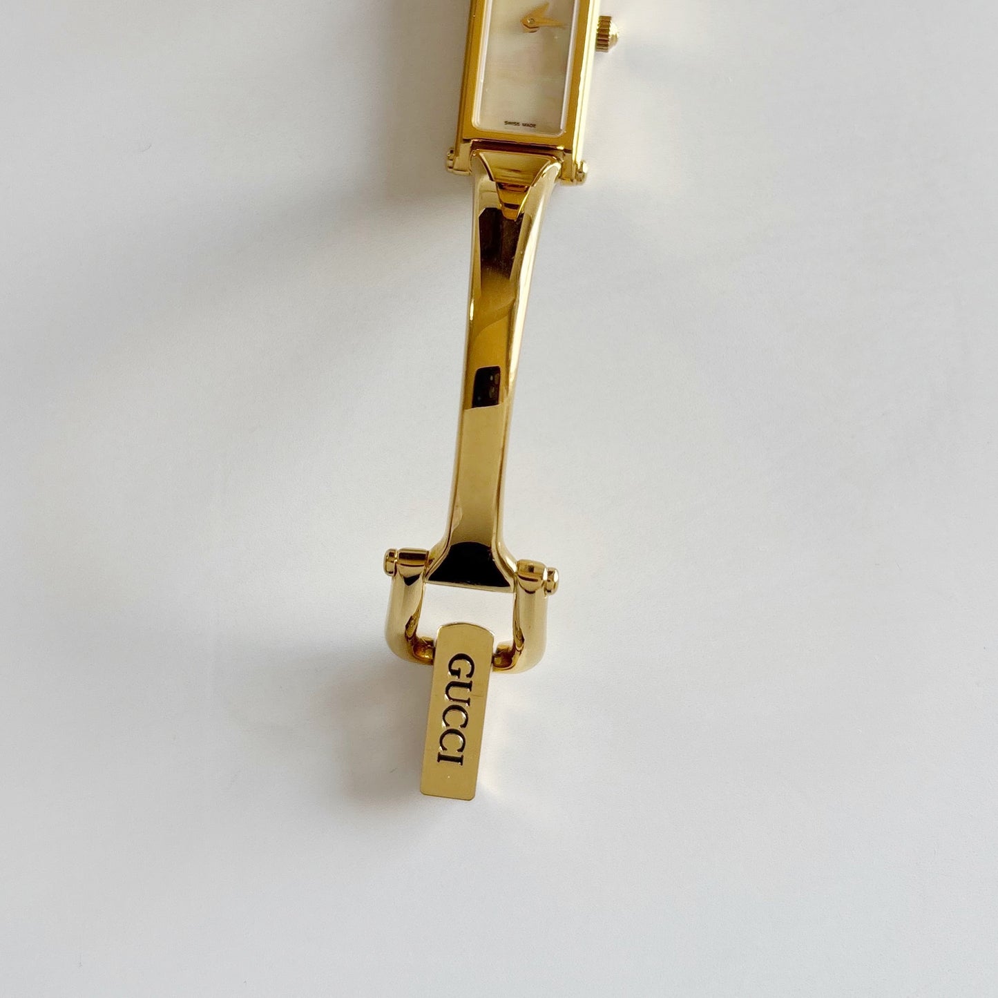 Gucci 1990s Rectangular Seashell Dial Gold Plated Bangle Watch