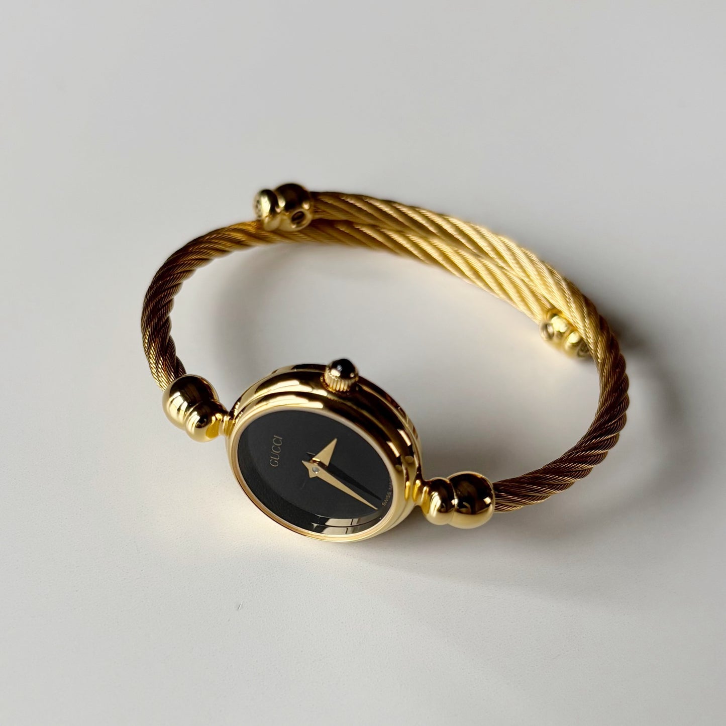 Gucci 1990s Black Dial Gold Plated Cable Bangle Watch