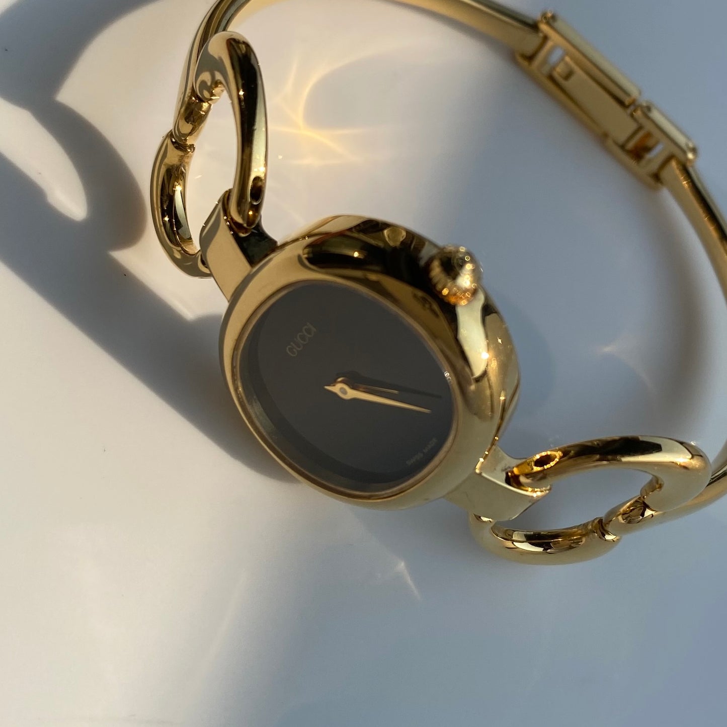 Gucci 1990s Black Dial Gold Plated Bangle Watch