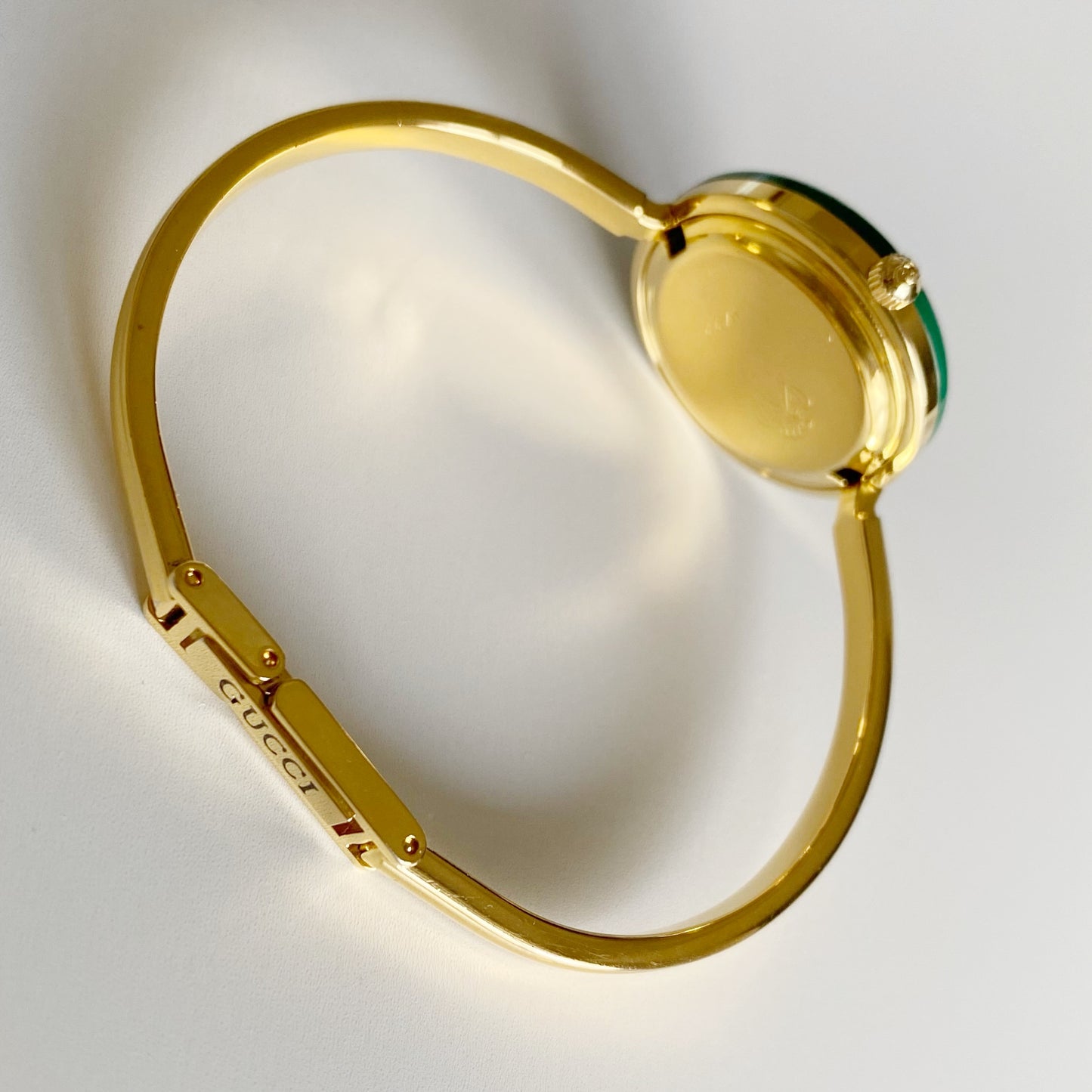 Gucci 1990s Interchangeable Bezel Gold Plated Bangle Watch with 12 bezels, case