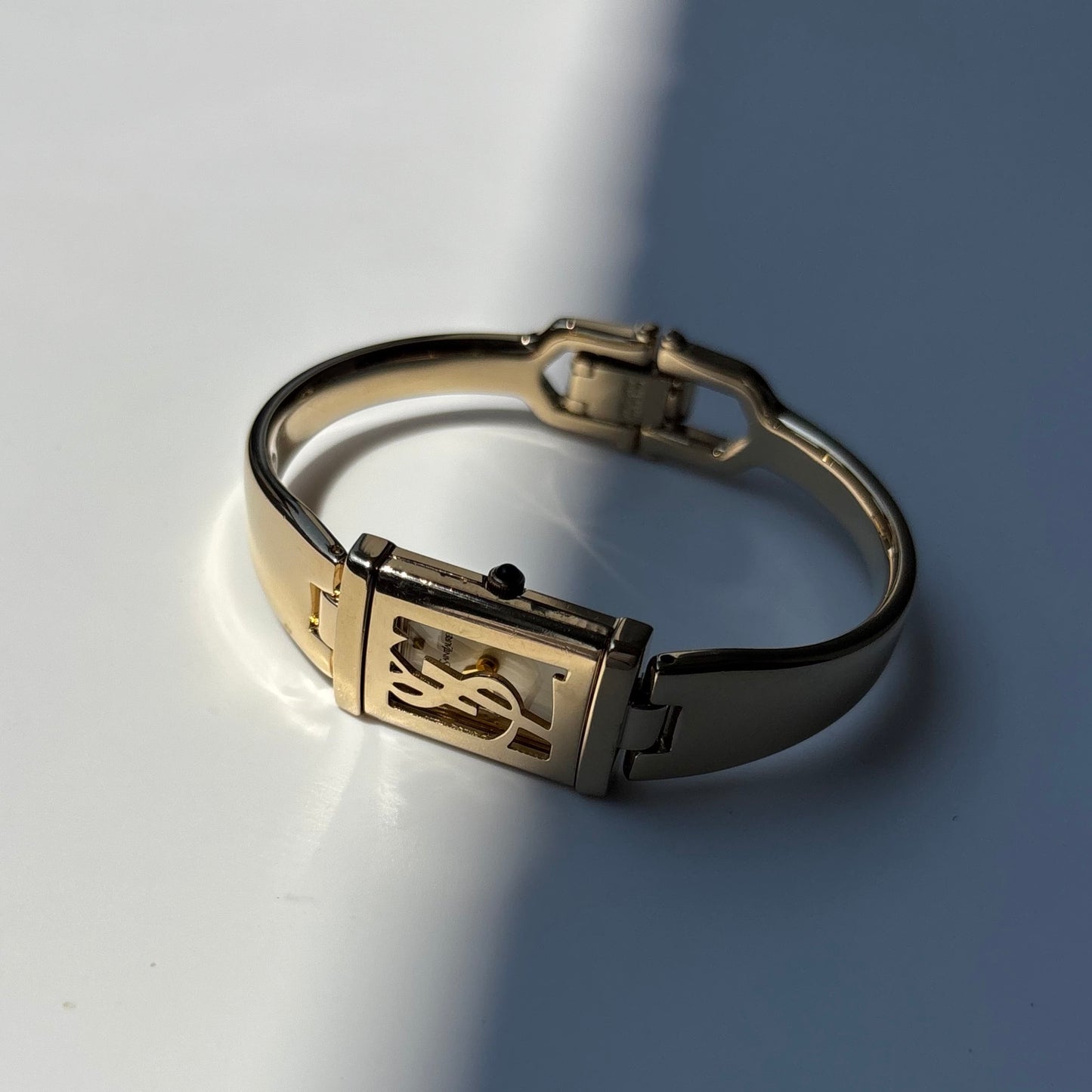 Yves Saint Laurent 1990s Peek a boo Gold Plated Bangle Watch