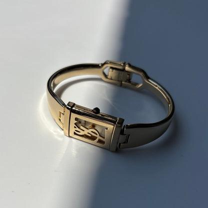 Yves Saint Laurent 1990s Peek a boo Gold Plated Bangle Watch