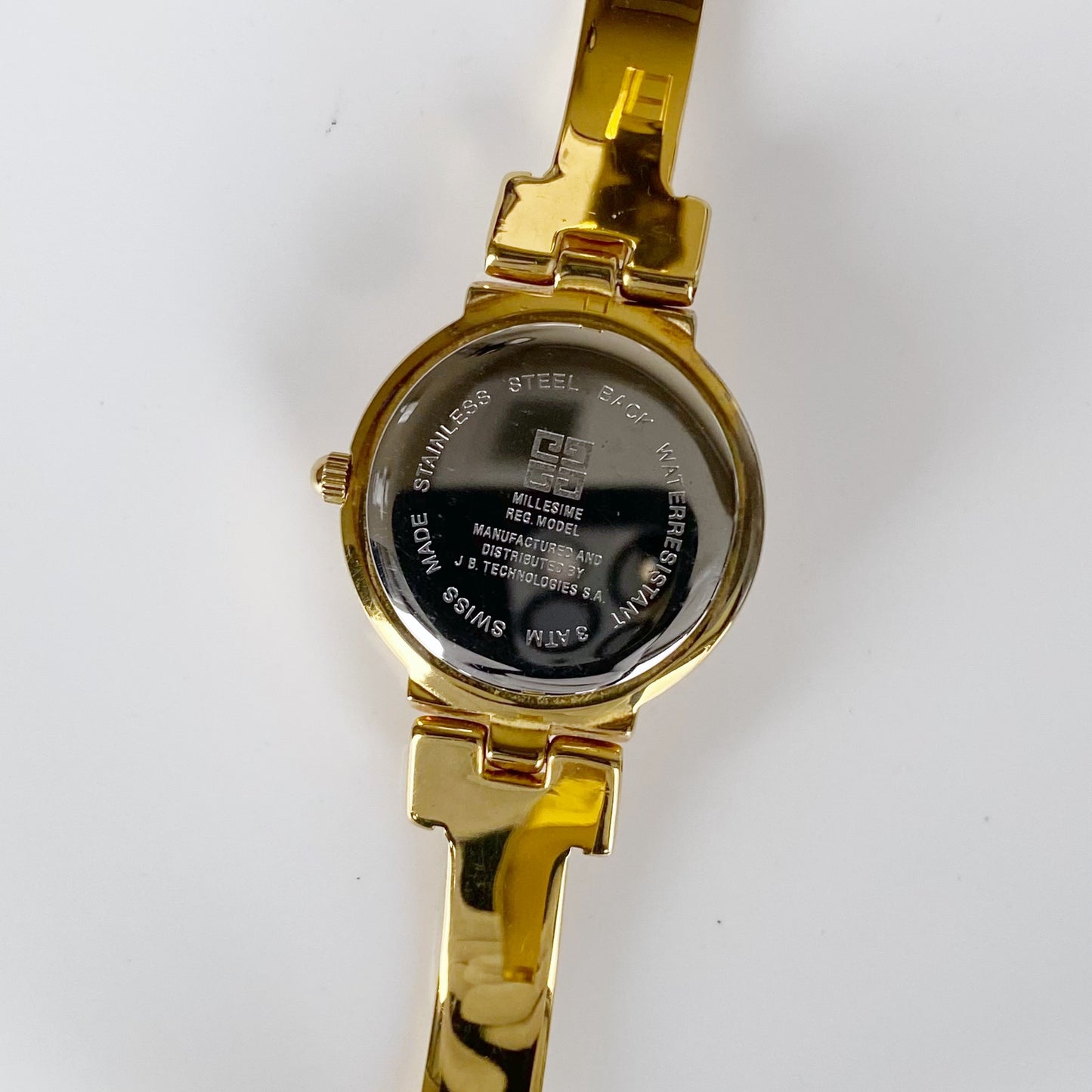 Givenchy 1990s Gold Plated Round Bangle Watch