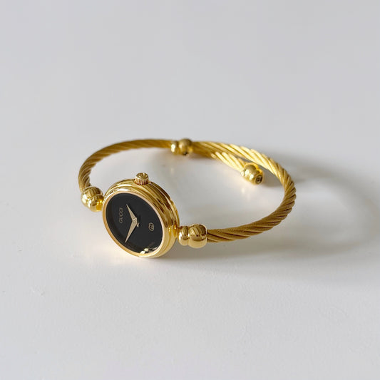 Gucci 1990s Black Dial Gold Plated Cable Bangle Watch