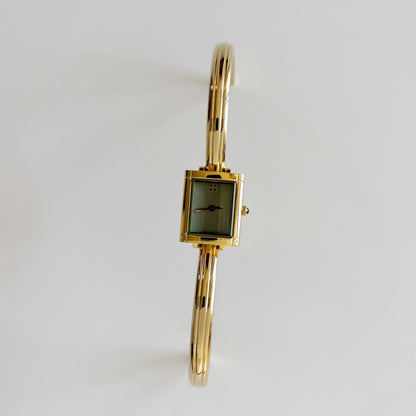 Yves Saint Laurent 1990s Green Dial Gold Plated Bangle Watch