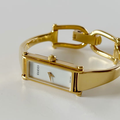 Gucci 1990s Seashell Rectangular Dial Gold Plated Bangle Watch (Small)