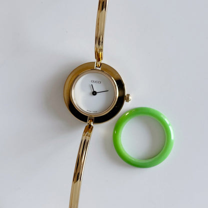 Gucci 1990s Interchangeable Bezel Gold Plated Bangle Watch with 12 bezels, case