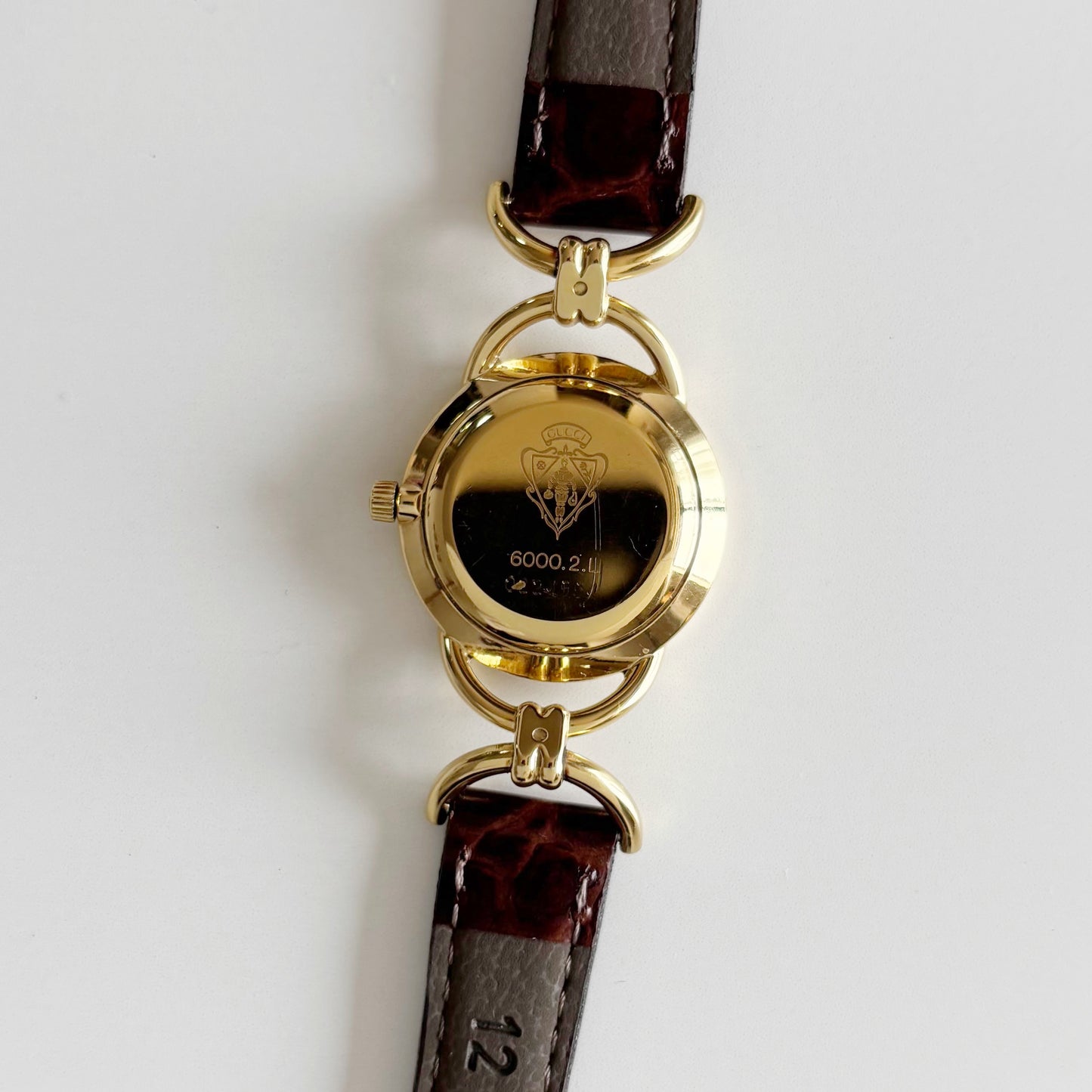 Gucci 1990s Round Dial Gold Plated Horsebit Watch