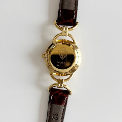 Gucci 1990s Round Dial Gold Plated Horsebit Watch