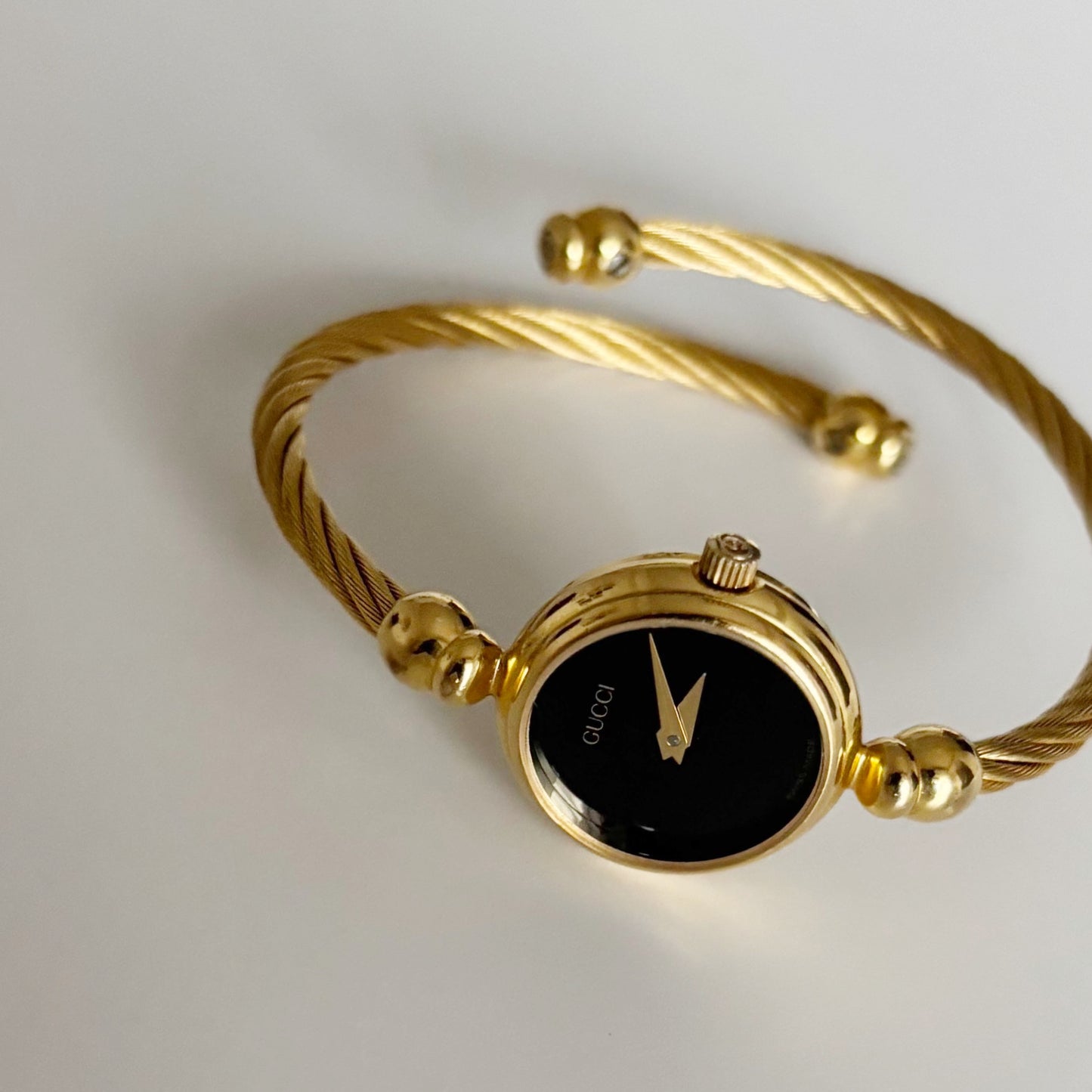 Gucci 1990s Black Dial Gold Plated Cable Bangle Watch