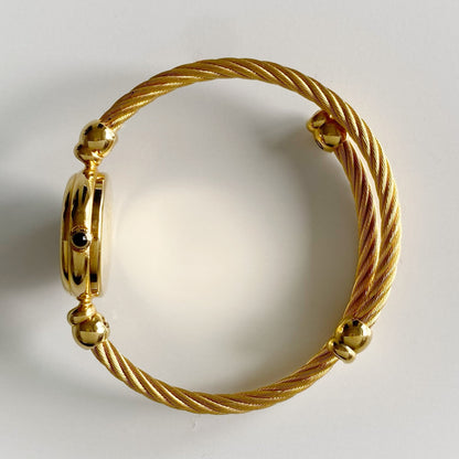 Gucci 1990s Black Dial Gold Plated Cable Bangle Watch